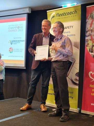 AfMa's Mace Hartley presents Fleet Product Safety Award to Fleetcoach  
